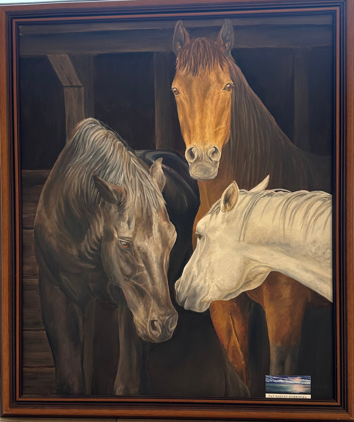 Framed painting of three horses