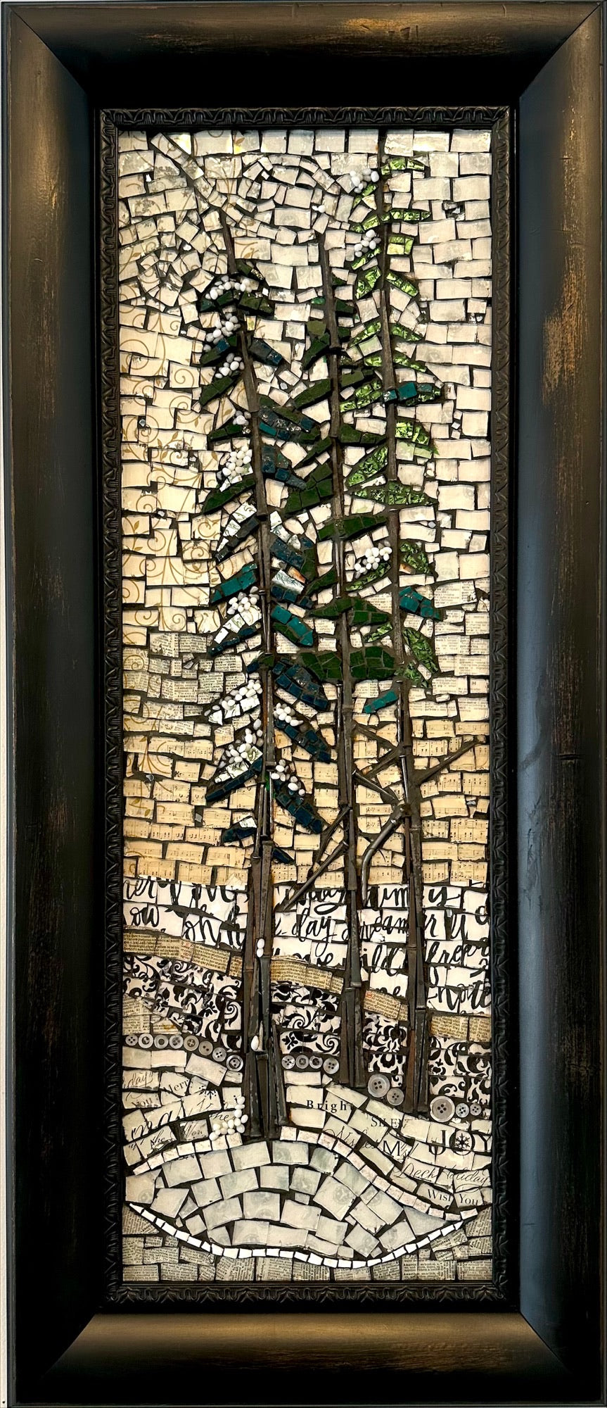 Mosaic artwork of two trees with a textured background